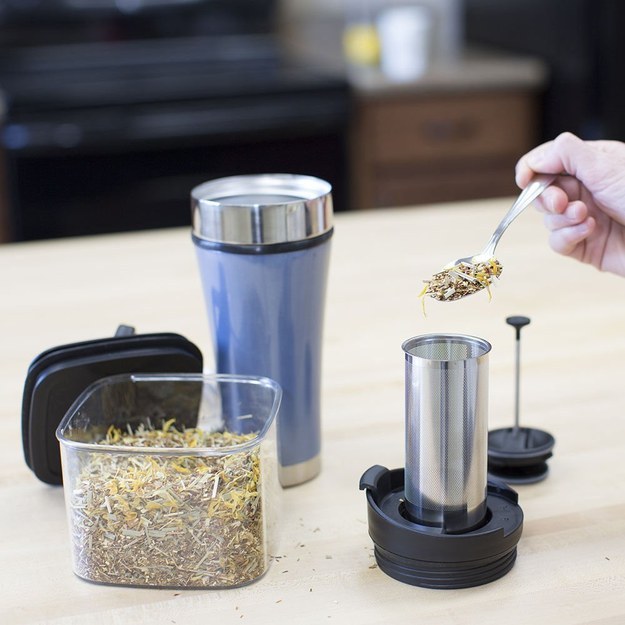 A travel mug with a built-in tea infuser.