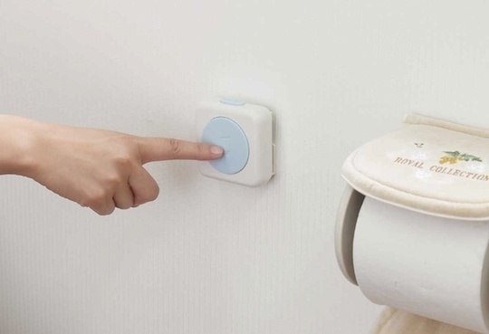 A button you place in your bathroom to block out all the potential sounds you'd usually make in there.