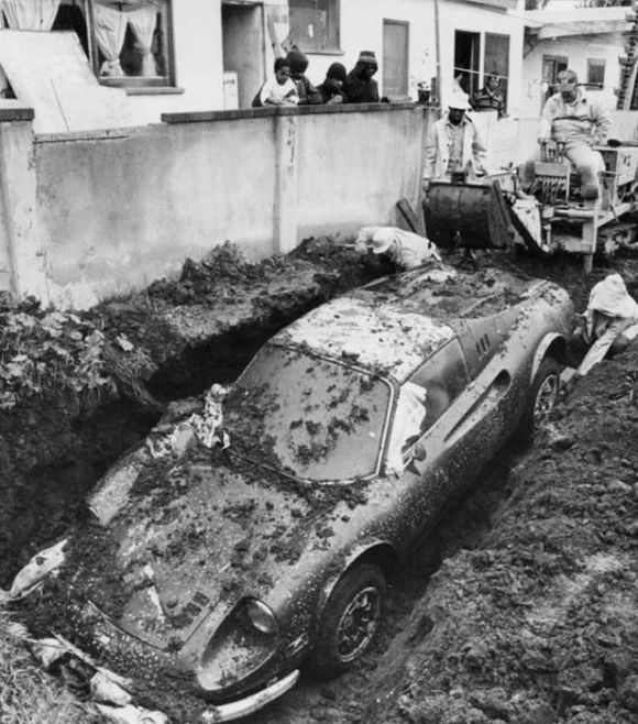 A buried Ferrari Dino was unearthed by some young boys. 