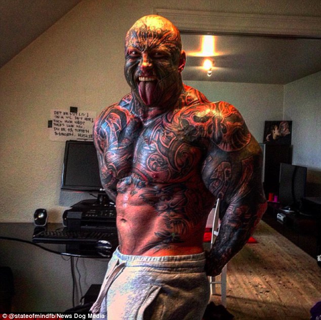 Beast mode: Danish weightlifter Jens Dalsgaard boasts more than 40 tattoos on his face and body, weighs 20 stone and consumes no less than 5,500 calories per day to fuel his hulking frame