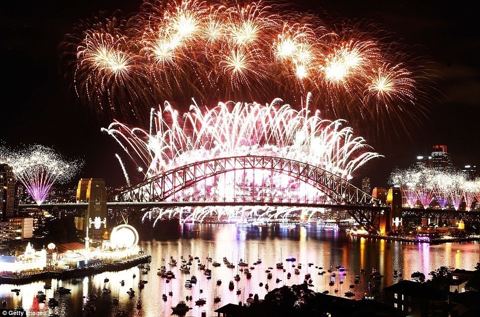 The Sydney Harbor bridge was lit up with fireworks to ring in the new year.