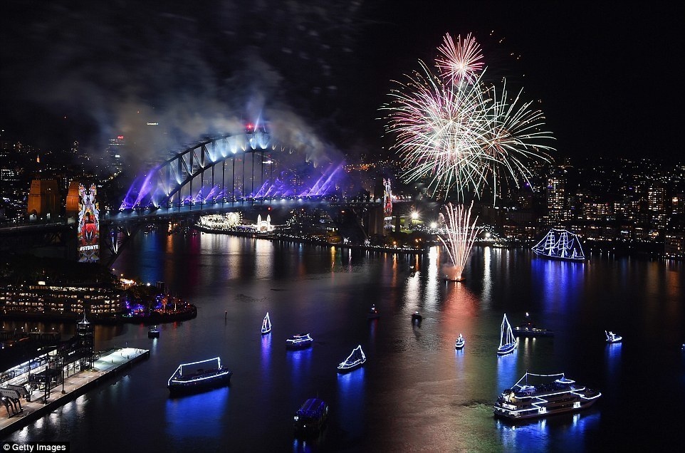 At one point, the Harbour and the bridge was lit up with purple lights as fireworks filled the night sky above the city of Sydney 