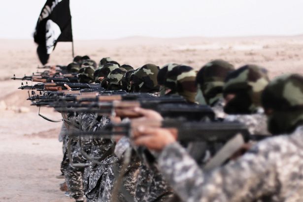 Islamic State of Iraq masked militants firing weapons