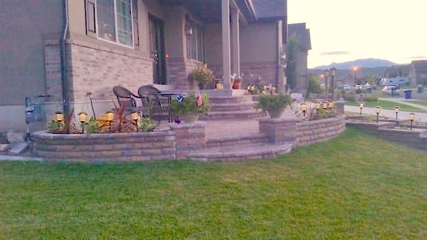 With the flowers and paving stones all in places, and the lights installed, his transformed front yard was complete!