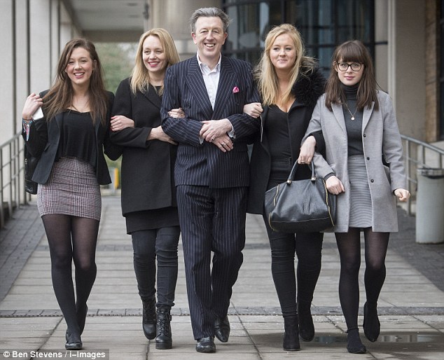 Paul Kohler smiles with his family outside court after the sentencing yesterday. Pictured (l-r) Daughter Saskia, wife Samantha, Mr Kohler, daughters Beth and Eloise
