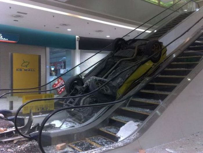 Sorry sir, escalators aren't for cars. 