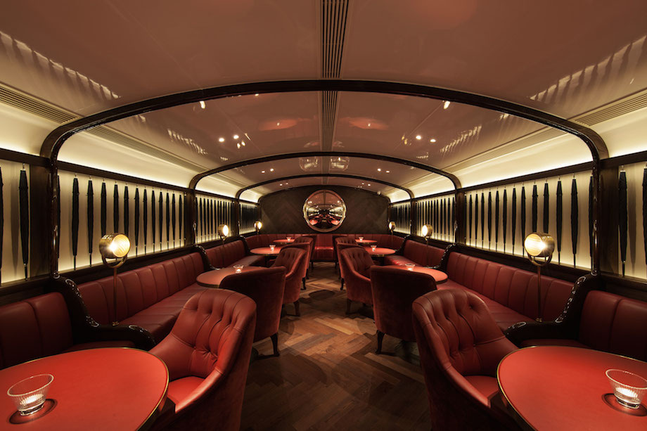 The VIP lounge resembles the elegance of a first class train cabin, equipped with curved ceilings and red leather throughout.