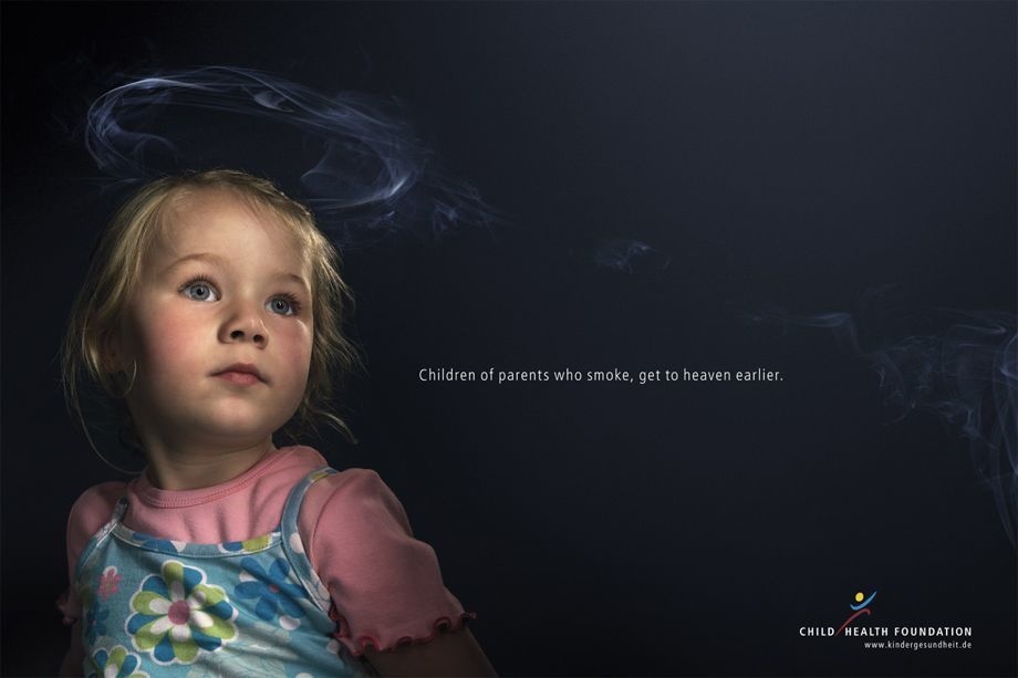 Pointing to the dangers of secondhand smoke with a beautiful child.