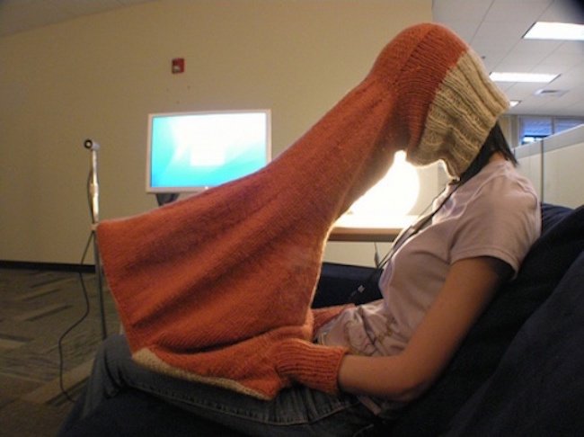 A cozy private laptop viewer so that nobody can see what you're really looking at. 