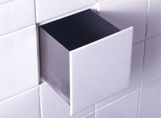 Remove a tile from your wall and replace it with a tile storage compartment to make a hidden storage in your bathroom.