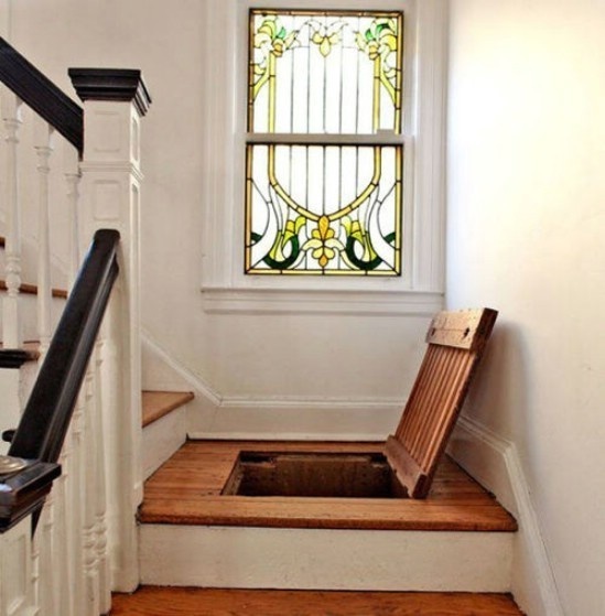 If your house has stairs, use the landing or a step to create a secret storage compartment. 