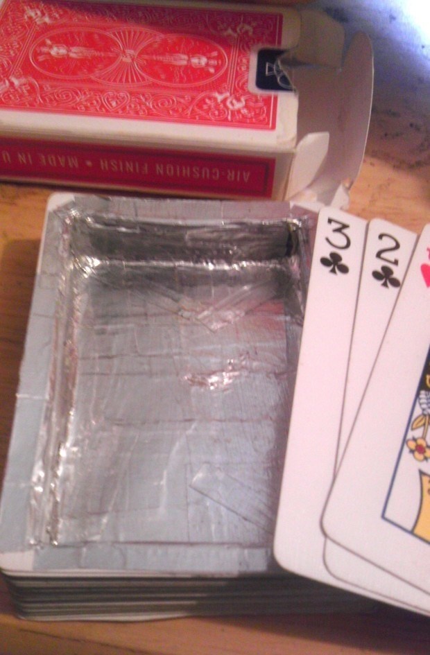 Similar to the hollow book, try creating a hollow deck of cards. 