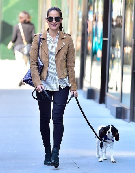 Olivia Munn with her adorable Cavalier King Charles Spaniel, Chance, in NYC. Munn frequently features him on Instagram.