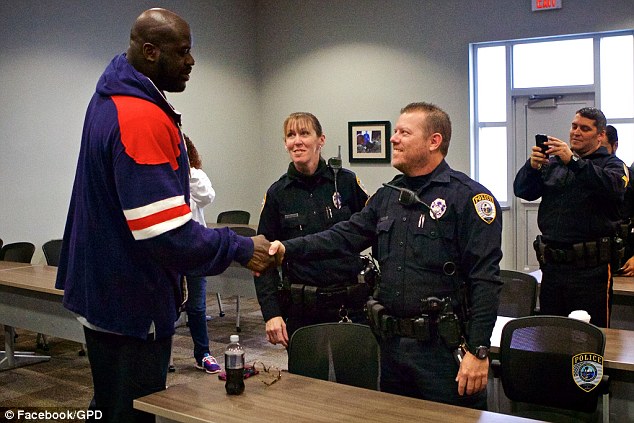 Officer White thought he was in a meeting to discuss the followup game he was going to have with the kids - when none other than Shaq O'Neal walked in the door