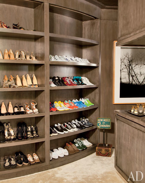Ellen DeGeneres and her partner Portia de Rossi share a closet in their Beverly Hills home. As you can see, they have decidedly different tastes in footwear.