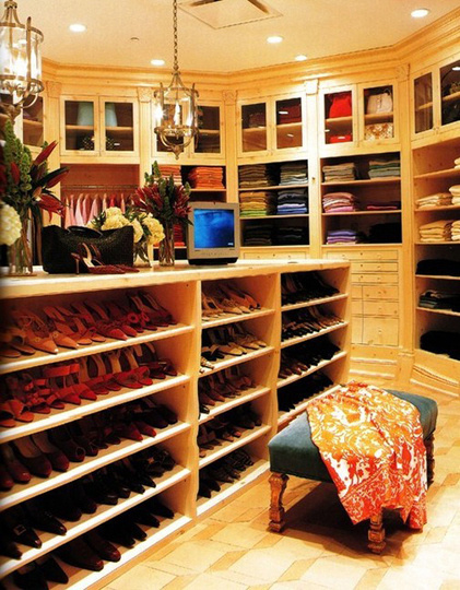 Oprah Winfrey's closet is grandiose and hyper-organized -- even her t-shirts are organized by color.