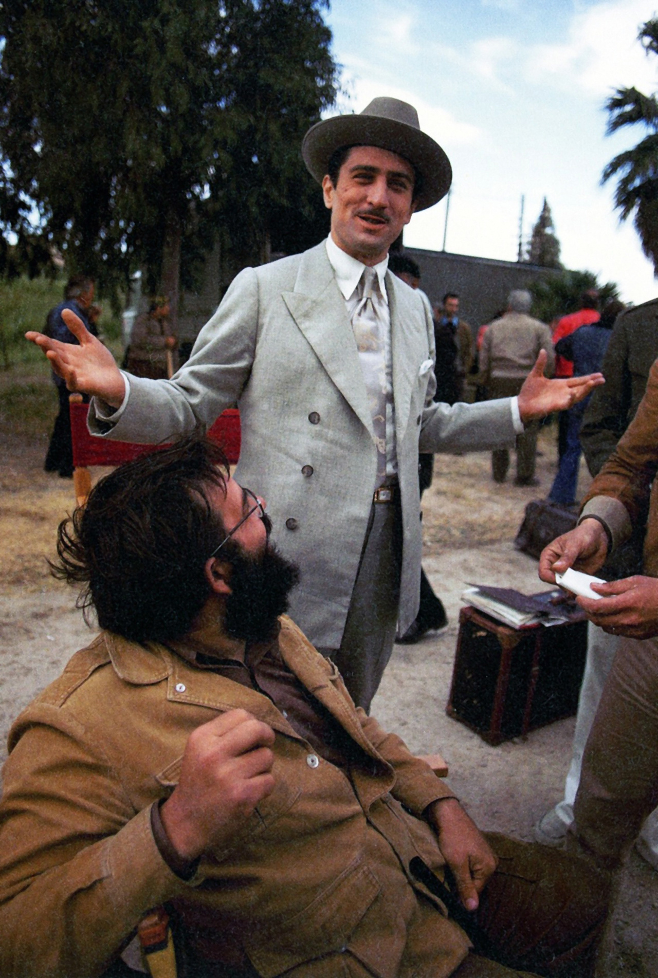 Actor Robert DeNiro and director Francis Ford Coppola share a light moment on the set of The Godfather: Part II.