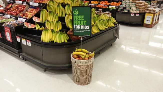 A basket of free fruit for kids as they wander through the grocery store.