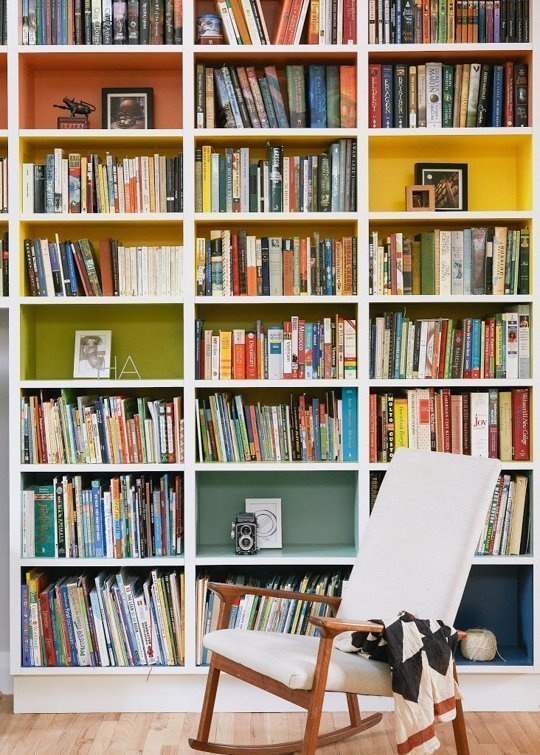 Paint the back of a bookcase, what better way to showoff your books than in front of a bold solid color? 