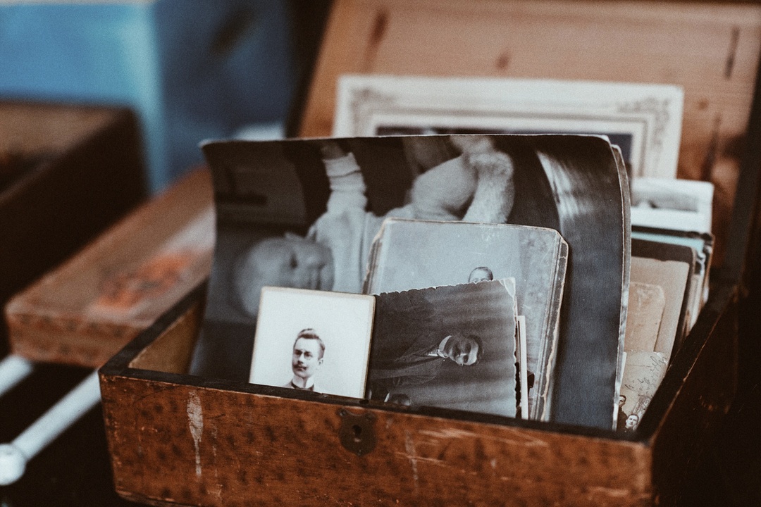 Put silica gel on your photos to preserve quality.