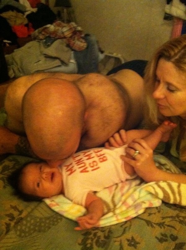 If you thought this man was putting the wrong end on his baby...
