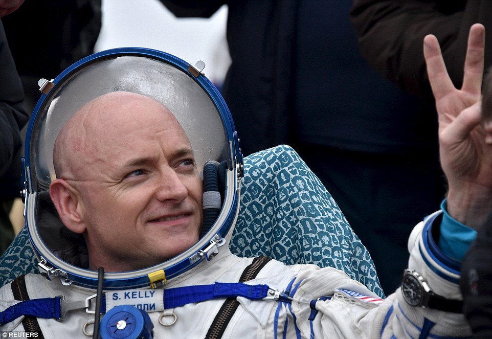 Scott Kelly, Nasa's space-endurance astronaut who returned to bitterly cold Kazakhstan on yesterday, along with his crew mate for the past year, Mikhail Kornienko. Pictured is Kelly soon after he landed back on Earth yesterday
