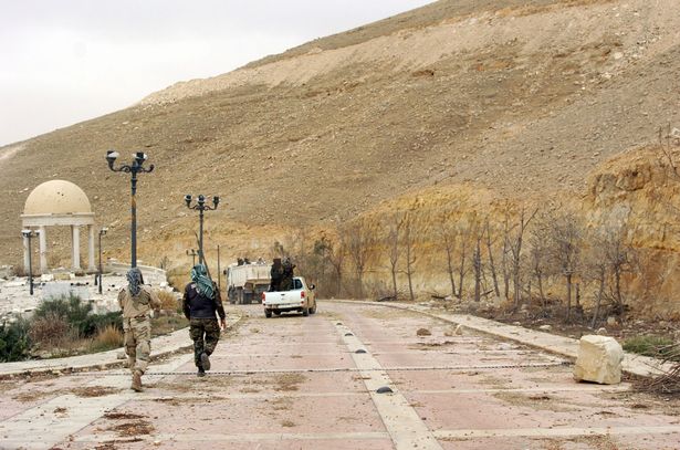 Syrian troops in the outskirts of the ancient city of Palmyra