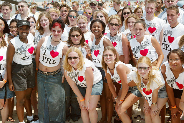 Kids then: Sorority squatting in their TRL shirts and long-ass denim skirts.