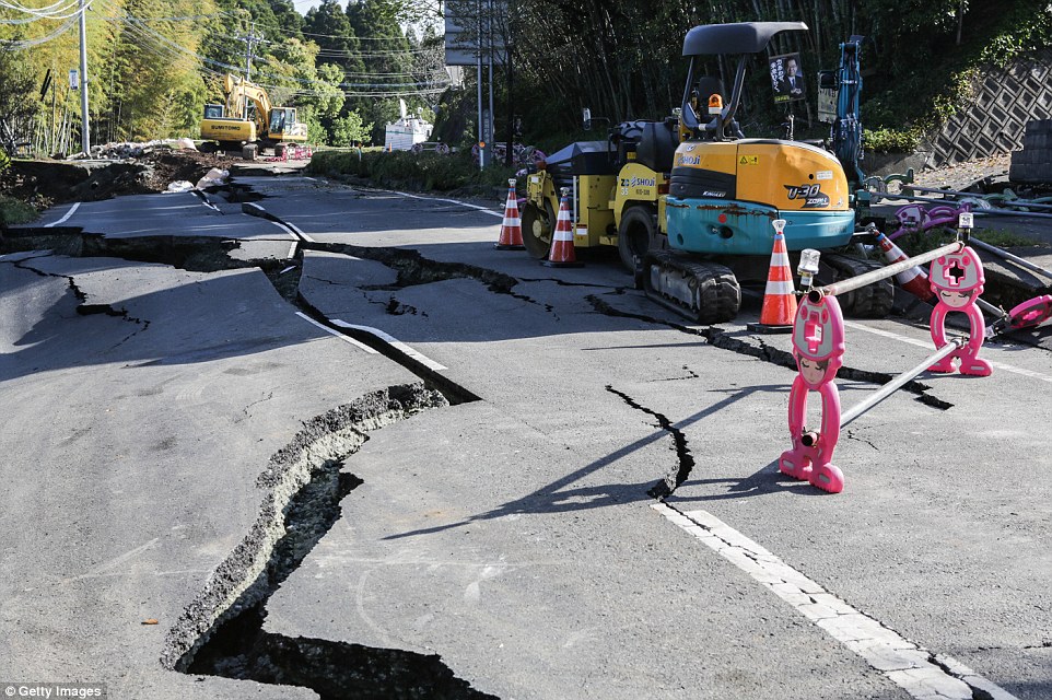 Groundbreaking: The massive earthquake was so powerful that it cracked the concrete, breaking up the road in the region
