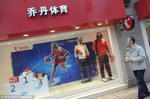 Double take: Anyone walking past this Qiaodan Sports shop in Shanghai could be forgiven for thinking it was an official Michael Jordan store