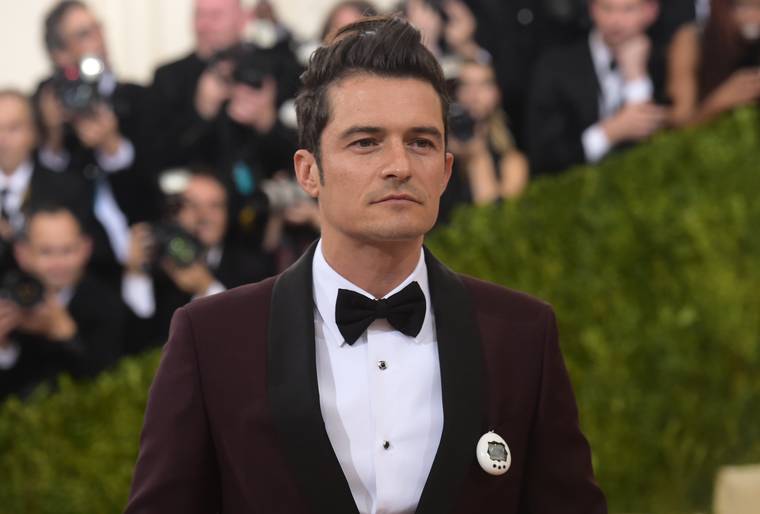 People Are Freaking Out Over Orlando Bloom's Pooping Tamagotchi at the Met Gala