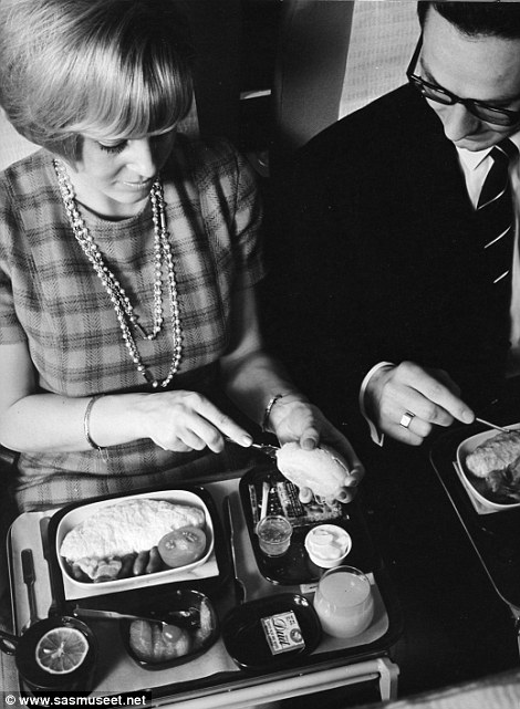 Many of the images were taken before the cabin was divided up into economy, business and first class, meaning that everyone was served a lavish meal