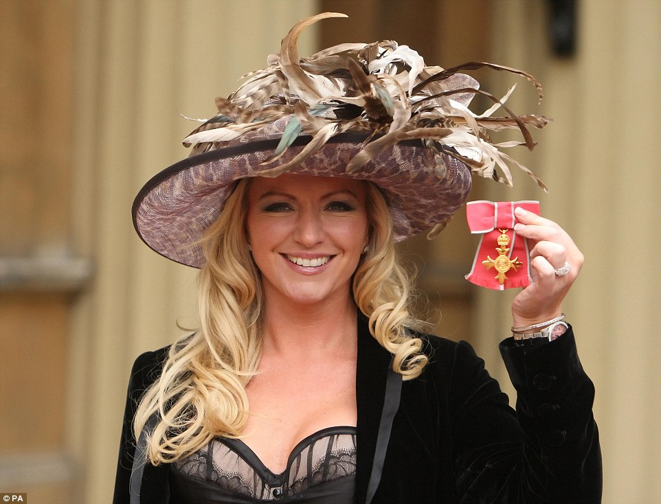 Baroness Mone outside Buckingham Palace after picking up her OBE medal in an investiture ceremony by the Princess Royal in 2010 