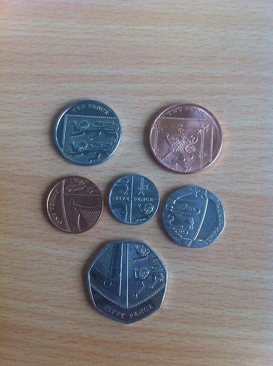 The pictures on Britain's coins are actually of the coat of arms for the country.