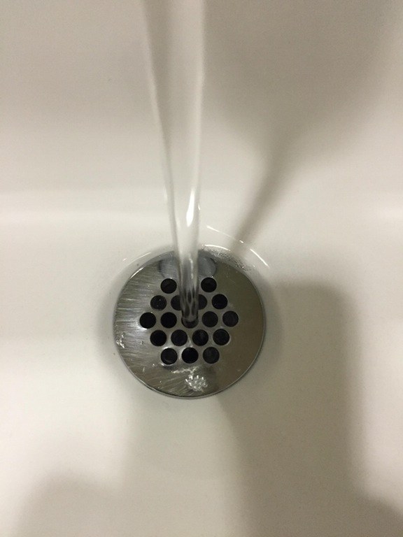 This faucet flows perfectly into the drain, much like how your relationship went down the drain when you found out Shawn cheated on you with Ashley from work.