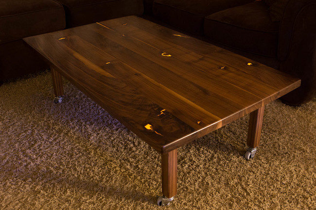 But you don't have to go with blue resin, here's a golden glowing table.