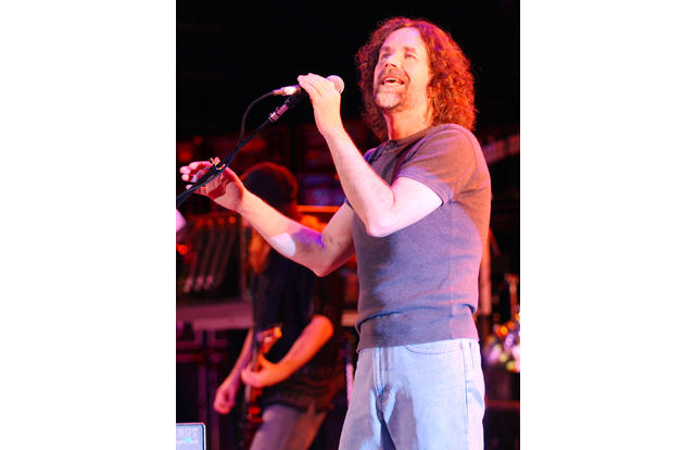 31 Jul 2003, Mountain View, California, USA --- BOSTON's Brad Delp performing on stage at 98.5 KFOX's 2nd Annual "Greg's Kihncert" at the Shoreline Amphitheater. Boston is currently on tour supporting their Corporate America album (writer/producer, Tom Scholz) release. --- Image by © Tim Mosenfelder/Corbis