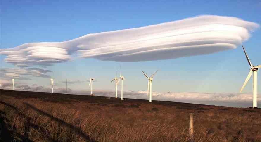 Rare lenticular clouds over the wind farms of the village of Oxenhope in West Yorkshire.