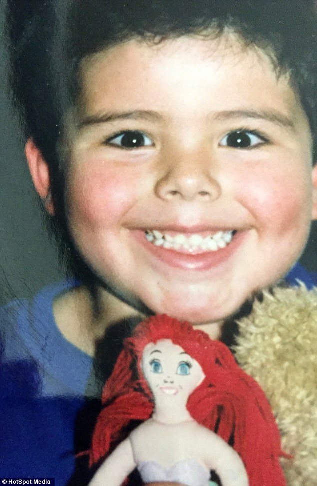 Starting young: Richard pictured as a child holding his favourite Ariel doll