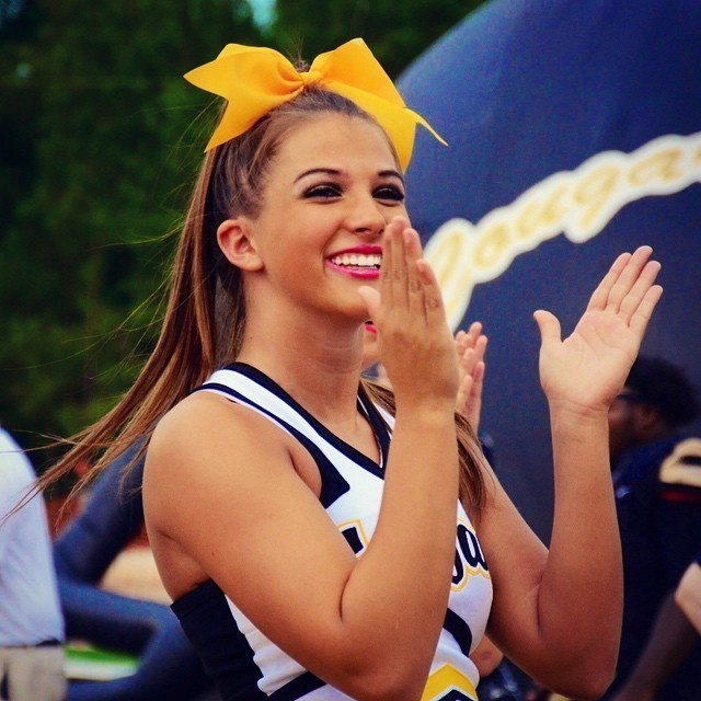 Now, she's REALLY grown up and a cheerleader at her high school.