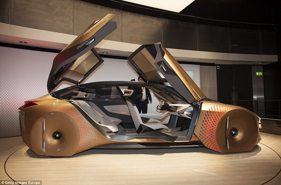 The sleek BMW concept looks straight out of a sci-fi movie. The automotive firm claim that constant connectivity, digital intelligence and state-of-the-art technologies turns the driver into the 'Ultimate Driver'