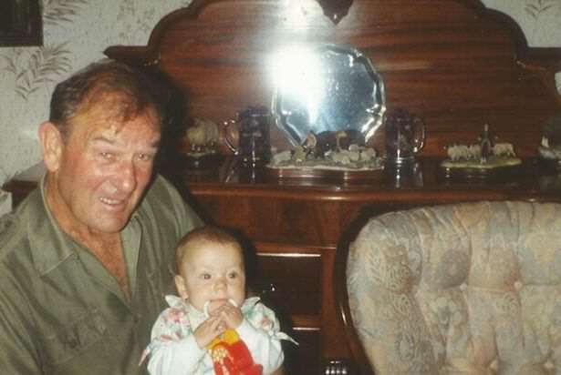 Kimberley with her granddad Ken in the living room at Stott Hall Farm