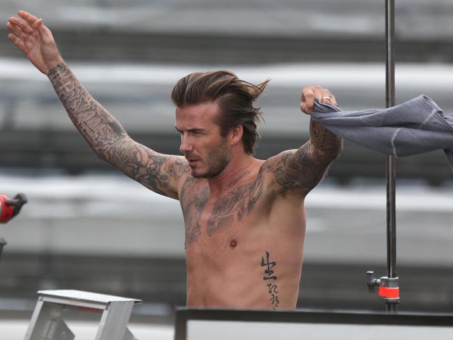 David Beckham loves his ink.