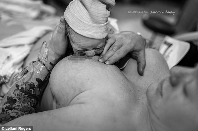Learning curve: The photographer said she often sees new mothers struggle to position the baby correctly