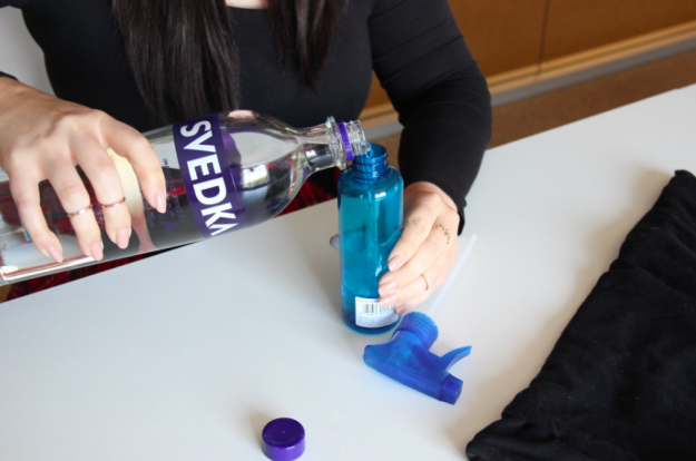 For this hack, pour some vodka into a spray bottle...