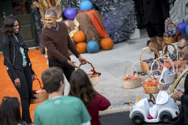 The president just couldn't deal with how cute the kid's costume was.