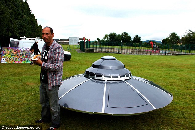 The Garda were in fact escorting Ali Kemal Ali¿s (pictured) homemade 10ft spaceship