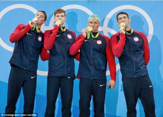 Ryan Lochte's silver dye job had turned a noticeable shade of green as he smiled on the podium with Michael Phelps, Conor Dwyer and Townley Haas on Tuesday night 