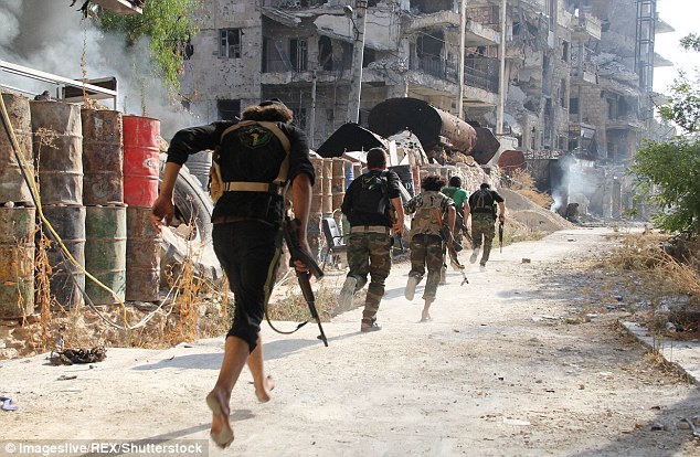 The Aleppo elite forces battalion, one of them in bare feet,  advancing towards the battle of Saif al-Dawla against the Syrian regime army in Aleppo