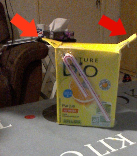 Raise the triangles on the sides of a juice box to make it easier for little kids to lift.